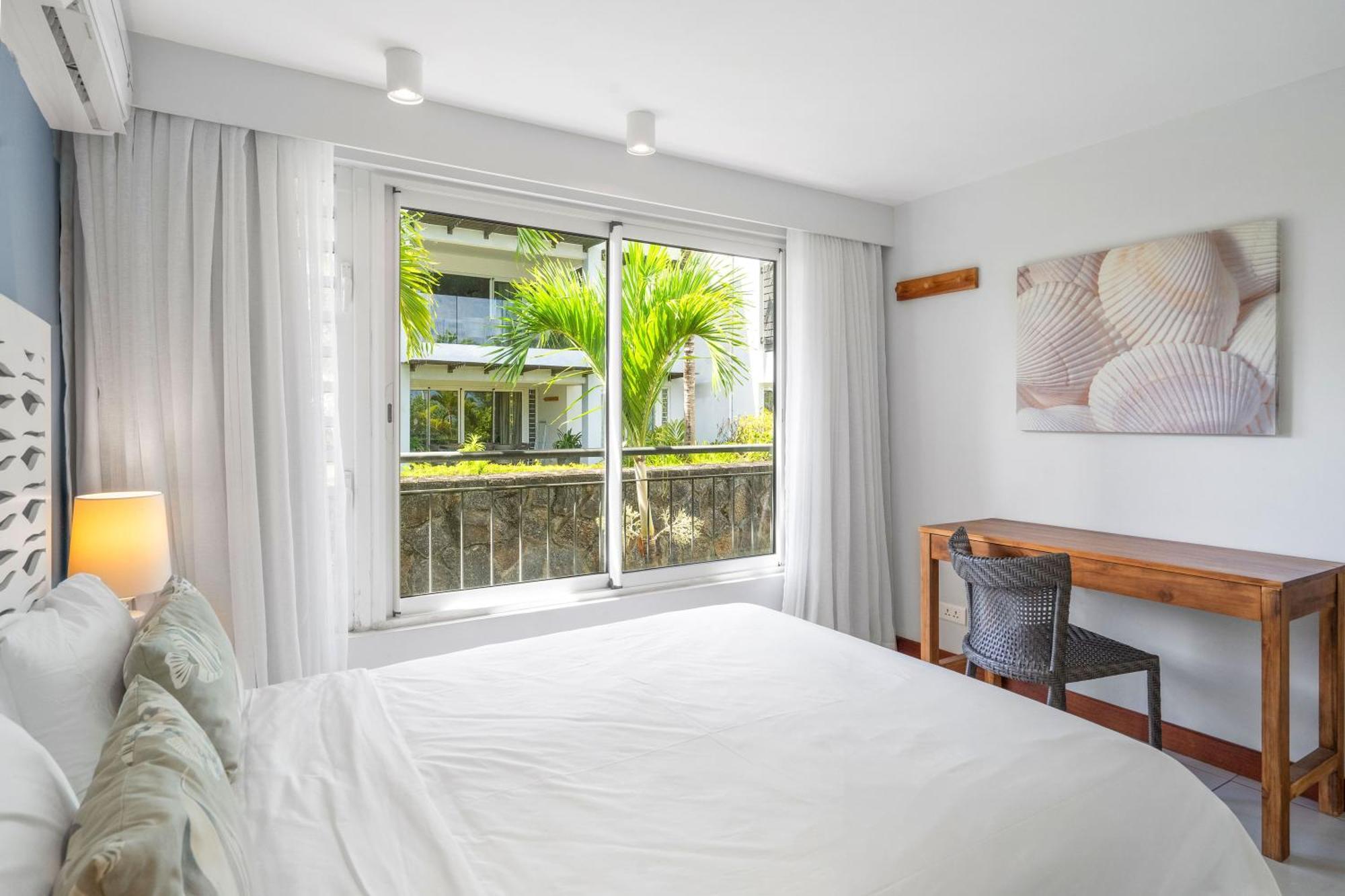 Kanope Bay - Holiday Beachfront Apartments Pointe aux Biches Bagian luar foto